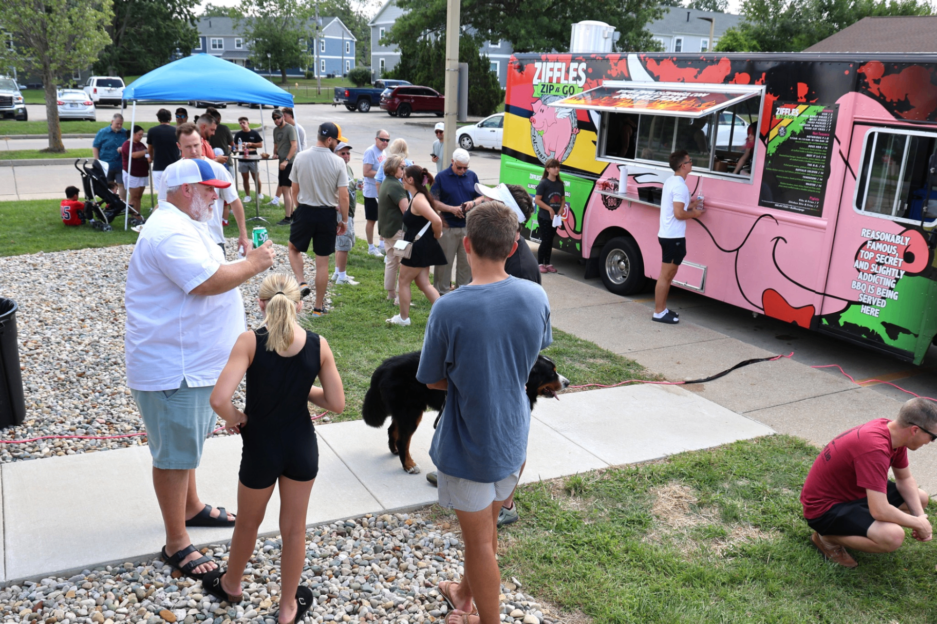 Outdoor community event with food truck